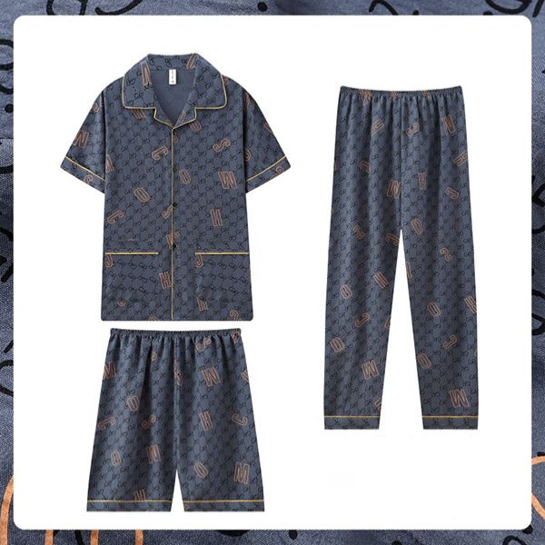 Bộ đồ ngủ lụa xanh họa tiết chữ gồm áo cộc tay, quần dài và quần short cho nam