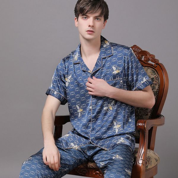 Bộ pijama nam lụa màu xanh họa tiết hoạt hình tay ngắn quần dài